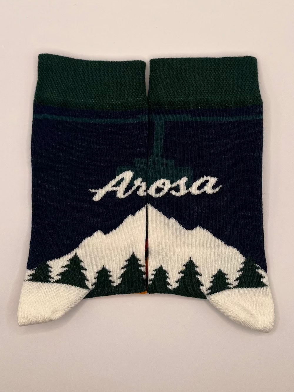 Knitted socks with the Arosa Logo, Weisshorn Cable Car & Mountain. Perfect as a gift or souvenir from the Swiss Alps.