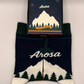 Unisex Arosa knit socks presented in a custom 1800m Club gift box.