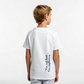Kids Ray Tee in white cotton, Ray mascot screenprinted on chest, ‘I’m not lost, I’m exploring’ text on back, screenprinted in Arosa, Switzerland.