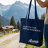 Discover Arosa Tote Bag, organic cotton tote with ‘Follow the Sun. Trust the Mountain.’ design, screenprinted in Arosa, Switzerland